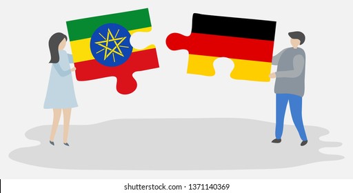 Couple holding two puzzles pieces with Ethiopian and German flags. Ethiopia and Germany national symbols together.