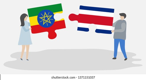 Couple holding two puzzles pieces with Ethiopian and Costa Rican flags. Ethiopia and Costa Rica national symbols together.