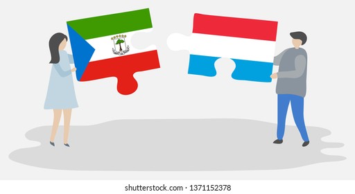 Couple holding two puzzles pieces with Equatorial Guinean and Luxembourgish flags. Equatorial Guinea and Luxembourg national symbols together.
