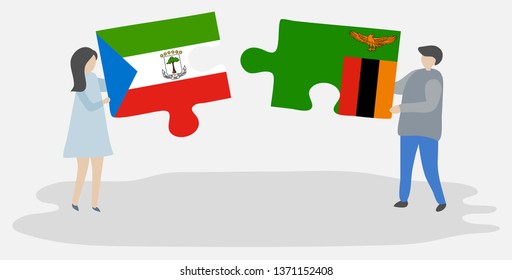 Couple holding two puzzles pieces with Equatorial Guinean and Zambian flags. Equatorial Guinea and Zambia national symbols together.