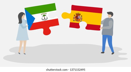 Couple holding two puzzles pieces with Equatorial Guinean and Spanish flags. Equatorial Guinea and Spain national symbols together.