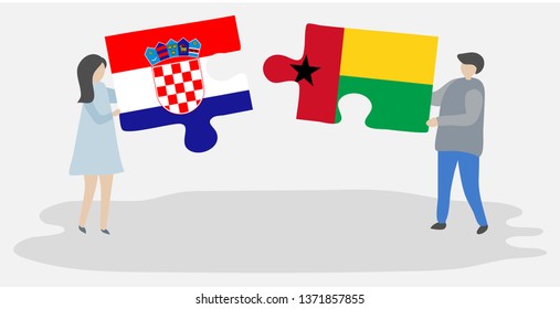Couple holding two puzzles pieces with Croatian and Bissau-Guinean flags. Croatia and Guinea-Bissau national symbols together.