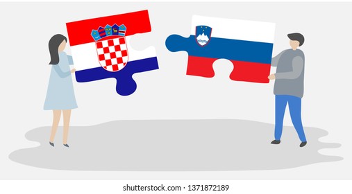 Couple holding two puzzles pieces with Croatian and Slovenian flags. Croatia and Slovenia national symbols together.