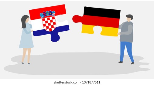 Couple holding two puzzles pieces with Croatian and German flags. Croatia and Germany national symbols together.