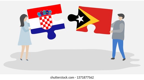 Couple holding two puzzles pieces with Croatian and Timorese flags. Croatia and East Timor national symbols together.