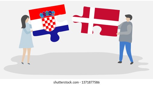 Couple holding two puzzles pieces with Croatian and Danish flags. Croatia and Denmark national symbols together.