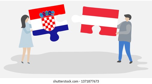 Couple holding two puzzles pieces with Croatian and Austrian flags. Croatia and Austria national symbols together.