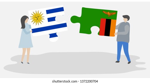 Couple holding two puzzles pieces with Uruguayan and Zambian flags. Uruguay and Zambia national symbols together.