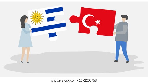 Couple holding two puzzles pieces with Uruguayan and Turkish flags. Uruguay and Turkey national symbols together.