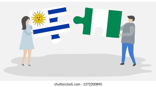 Couple holding two puzzles pieces with Uruguayan and Nigerian flags. Uruguay and Nigeria national symbols together.