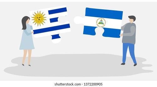 Couple holding two puzzles pieces with Uruguayan and Nicaraguan flags. Uruguay and Nicaragua national symbols together.