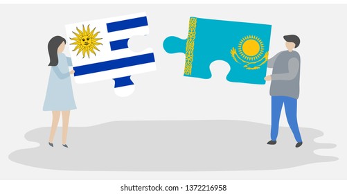 Couple holding two puzzles pieces with Uruguayan and Kazakh flags. Uruguay and Kazakhstan national symbols together.