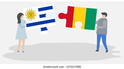Couple holding two puzzles pieces with Uruguayan and Guinean flags. Uruguay and Guinea national symbols together.