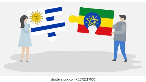 Couple holding two puzzles pieces with Uruguayan and Ethiopian flags. Uruguay and Ethiopia national symbols together.
