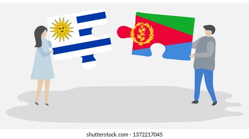 Couple holding two puzzles pieces with Uruguayan and Eritrean flags. Uruguay and Eritrea national symbols together.