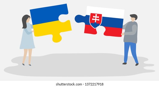 Couple holding two puzzles pieces with Ukrainian and Slovak flags. Ukraine and Slovakia national symbols together.