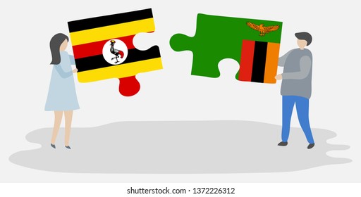 Couple holding two puzzles pieces with Ugandan and Zambian flags. Uganda and Zambia national symbols together.