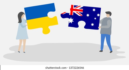 Couple holding two puzzles pieces with Ukrainian and Australian flags. Ukraine and Australia national symbols together.