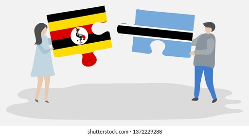 Couple holding two puzzles pieces with Ugandan and Motswana flags. Uganda and Botswana national symbols together.