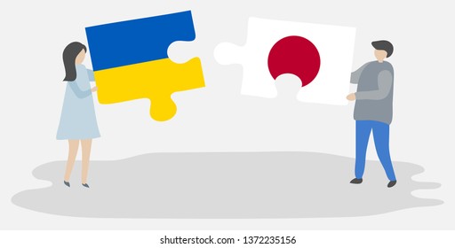 Couple holding two puzzles pieces with Ukrainian and Japanese flags. Ukraine and Japan national symbols together.