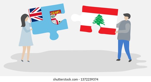 Couple holding two puzzles pieces with Fijian and Lebanese flags. Fiji and Lebanon national symbols together.