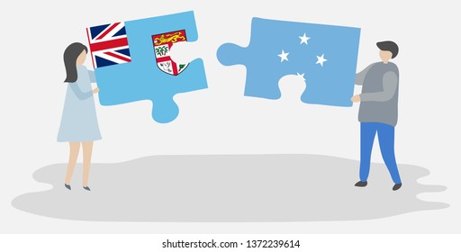 Couple holding two puzzles pieces with Fijian and Micronesian flags. Fiji and Micronesia national symbols together.