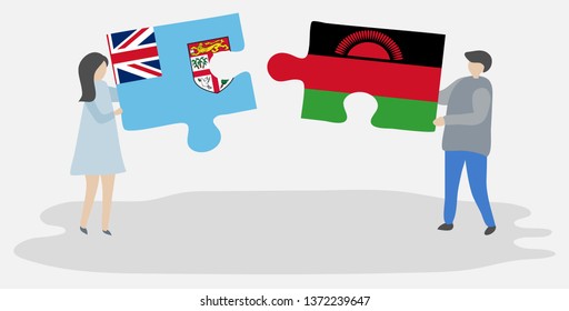 Couple holding two puzzles pieces with Fijian and Malawian flags. Fiji and Malawi national symbols together.
