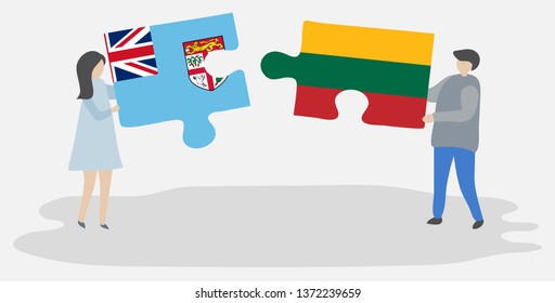 Couple holding two puzzles pieces with Fijian and Lithuanian flags. Fiji and Lithuania national symbols together.