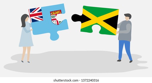 Couple holding two puzzles pieces with Fijian and Jamaican flags. Fiji and Jamaica national symbols together.