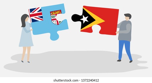 Couple holding two puzzles pieces with Fijian and Timorese flags. Fiji and East Timor national symbols together.