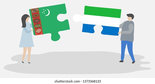 Couple holding two puzzles pieces with Turkmen and Sierra Leonean flags. Turkmenistan and Sierra Leone national symbols together.