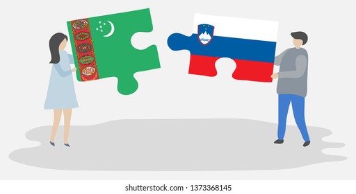 Couple holding two puzzles pieces with Turkmen and Slovenian flags. Turkmenistan and Slovenia national symbols together.