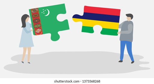 Couple holding two puzzles pieces with Turkmen and Mauritian flags. Turkmenistan and Mauritius national symbols together.
