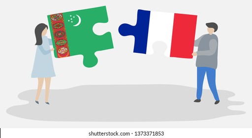 Couple holding two puzzles pieces with Turkmen and French flags. Turkmenistan and France national symbols together.