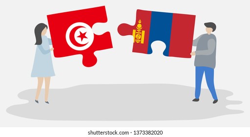 Couple holding two puzzles pieces with Tunisian and Mongolian flags. Tunisia and Mongolia national symbols together.