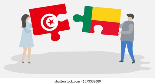 Couple holding two puzzles pieces with Tunisian and Beninese flags. Tunisia and Benin national symbols together.
