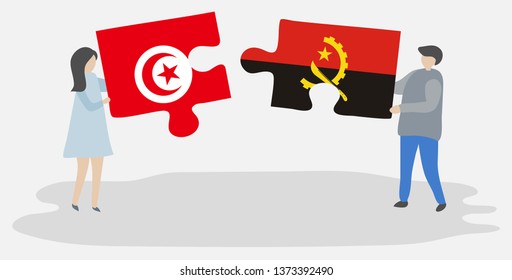 Couple holding two puzzles pieces with Tunisian and Angolan flags. Tunisia and Angola national symbols together.