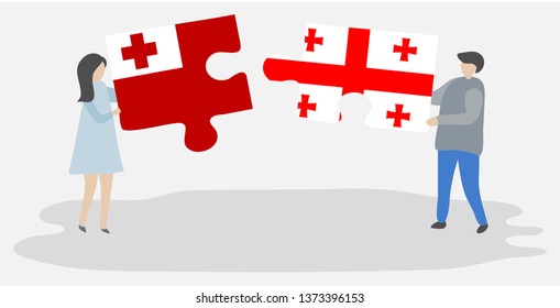 Couple holding two puzzles pieces with Tongan and Georgian flags. Tonga and Georgia national symbols together.