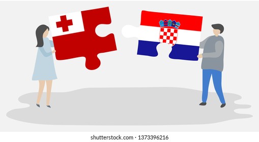 Couple holding two puzzles pieces with Tongan and Croatian flags. Tonga and Croatia national symbols together.
