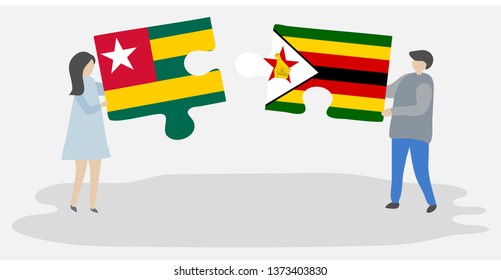 Couple holding two puzzles pieces with Togolese and Zimbabwean flags. Togo and Zimbabwe national symbols together.