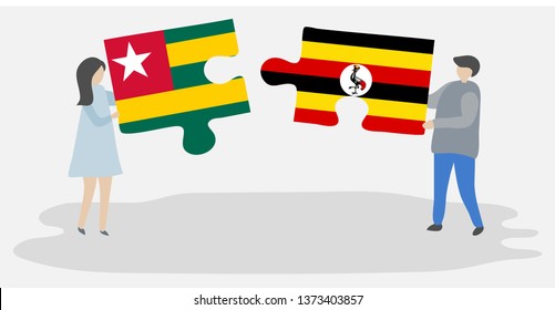Couple holding two puzzles pieces with Togolese and Ugandan flags. Togo and Uganda national symbols together.