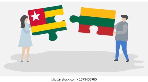 Couple holding two puzzles pieces with Togolese and Lithuanian flags. Togo and Lithuania national symbols together.