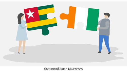 Couple holding two puzzles pieces with Togolese and Ivorian flags. Togo and Ivory Coast national symbols together.