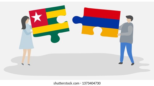 Couple holding two puzzles pieces with Togolese and Armenian flags. Togo and Armenia national symbols together.