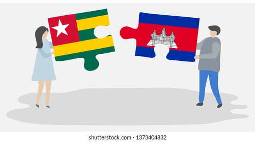 Couple holding two puzzles pieces with Togolese and Cambodian flags. Togo and Cambodia national symbols together.
