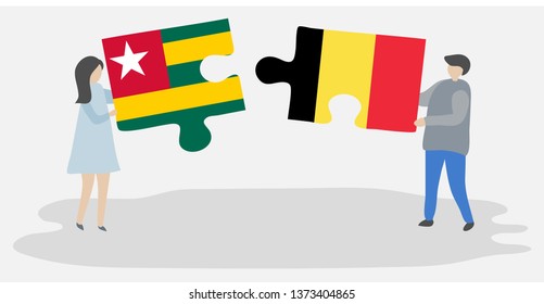 Couple holding two puzzles pieces with Togolese and Belgian flags. Togo and Belgium national symbols together.