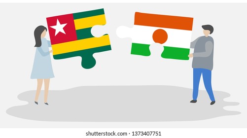 Couple holding two puzzles pieces with Togolese and Nigerien flags. Togo and Niger national symbols together.