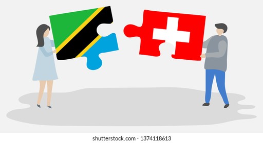 Couple holding two puzzles pieces with Tanzanian and Swiss flags. Tanzania and Switzerland national symbols together.
