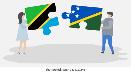 Couple holding two puzzles pieces with Tanzanian and Solomon Island flags. Tanzania and Solomon Islands national symbols together.