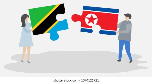 Couple holding two puzzles pieces with Tanzanian and North Korean flags. Tanzania and North Korea national symbols together.